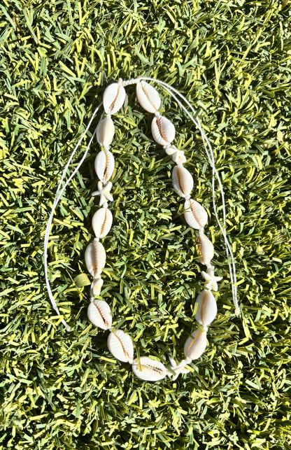 white cowrie shell necklace
