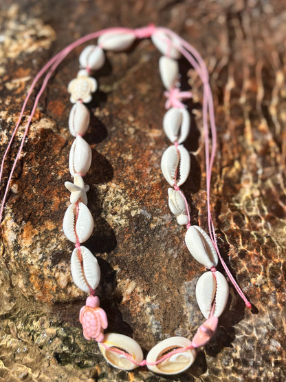 pink cowrie shell necklace